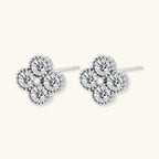 Anointed Garments platinum-plated sterling silver quatrefoil stud earrings featuring brilliant VVS1 moissanite stones.