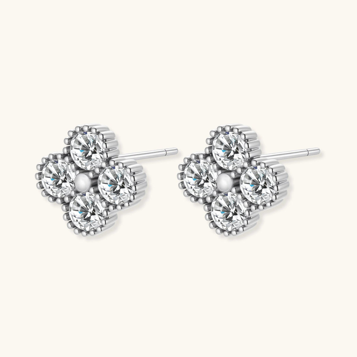 Anointed Garments platinum-plated sterling silver quatrefoil stud earrings featuring brilliant VVS1 moissanite stones.