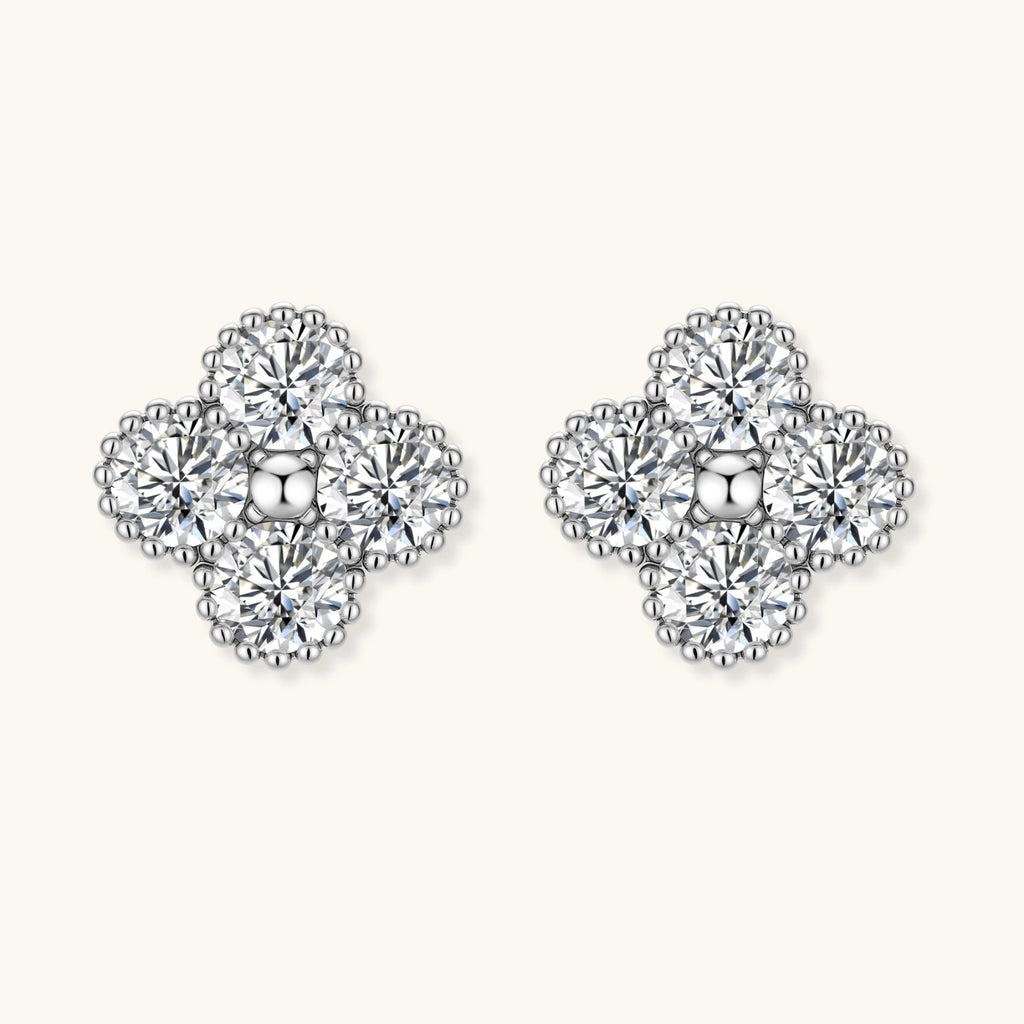 Anointed Garments quatrefoil stud earrings in platinum-plated 925 sterling silver with brilliant moissanite stones.