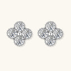 Anointed Garments quatrefoil stud earrings in platinum-plated 925 sterling silver with brilliant moissanite stones.