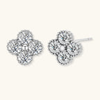 Anointed Garments platinum-plated sterling silver quatrefoil stud earrings featuring brilliant moissanite stones.