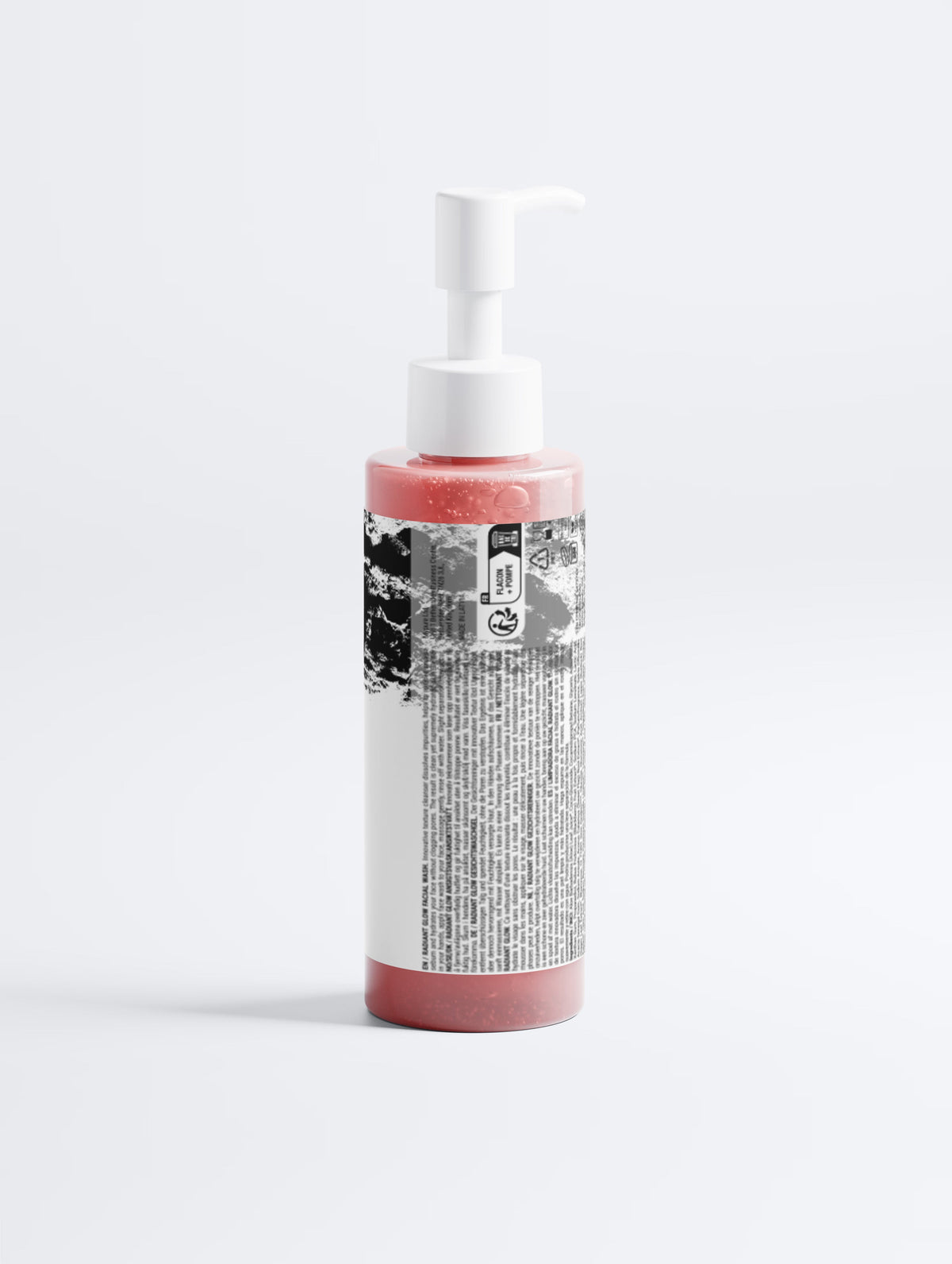 Anointed Garments Radiant Glow Facial Wash in a transparent pump bottle with a pink botanical cleansing formula.