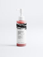 Anointed Garments Anointed Skin Radiant Glow Facial Wash in a transparent pump bottle with pink cleanser.