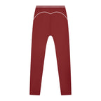 Anointed Garments high-waisted performance athletic leggings in deep red with white contrast piping, back view.