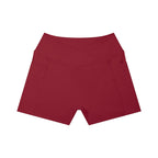 Anointed Garments high-rise yoga shorts in deep red with side pockets and a flattering crossover waistband.