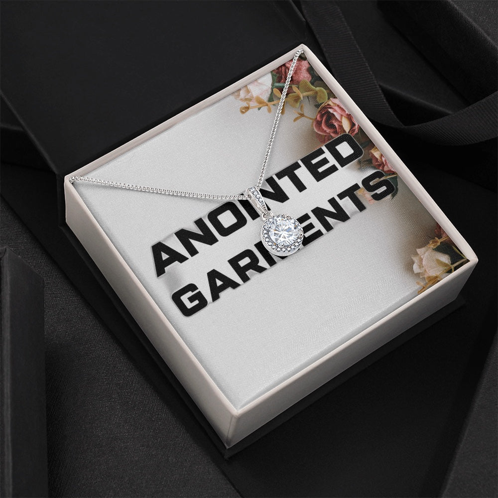 Anointed Garments round pendant necklace with a cubic zirconia halo in a branded gift box