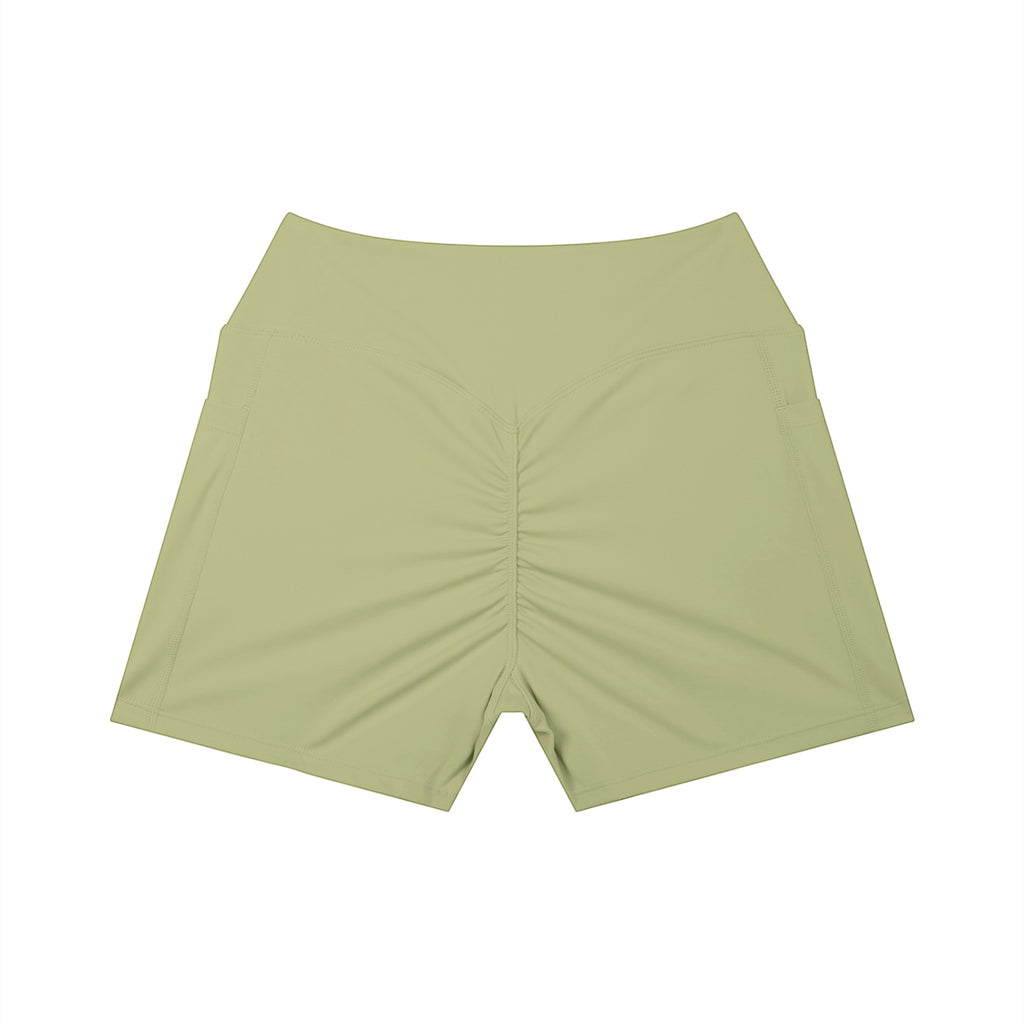 Anointed Garments sage green high-waisted athletic shorts with a ruched back and side pockets for performance.