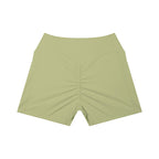 Anointed Garments sage green high-waisted athletic shorts with a ruched back and side pockets for performance.