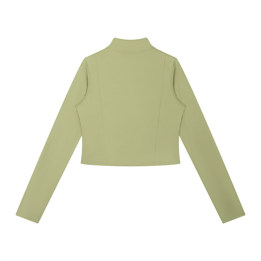 Back view of Anointed Garments sage green cropped long sleeve mock neck zip up jacket in high-stretch athletic fabric.