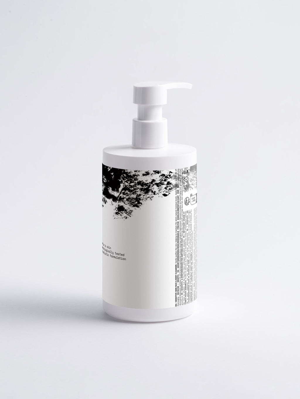 Anointed Garments Anointed Skin sensitive face and body cleanser in a white pump bottle against a neutral background.