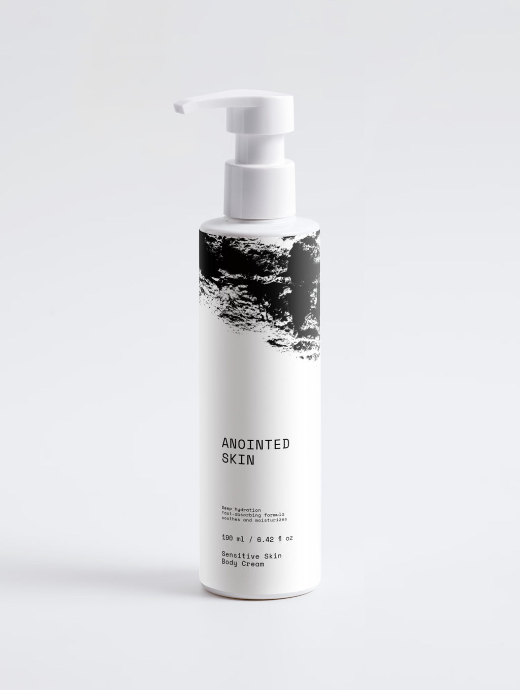 Anointed Garments Anointed Skin Sensitive Skin Face & Body Cream in a white pump bottle with black abstract design.