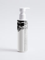 Anointed Garments Anointed Skin Sensitive Skin Face & Body Cream in a white pump bottle with black label details.