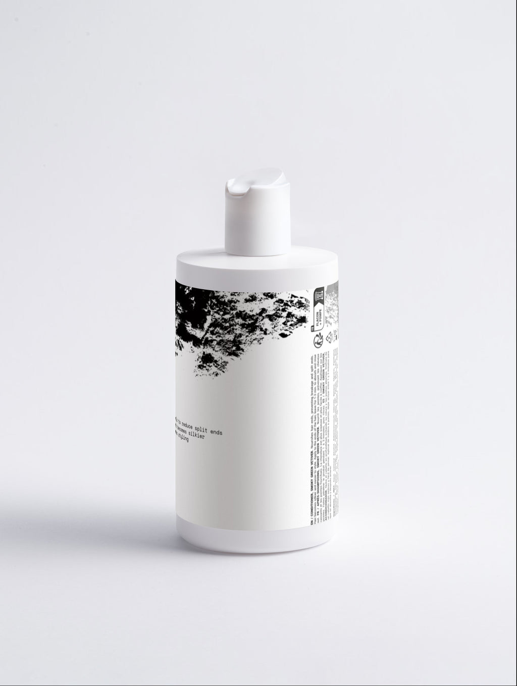 Anointed Garments Silk Repair Hair Conditioner in a white bottle with black text and abstract graphic design.