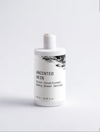 Anointed Garments Anointed Skin Silk Repair hair conditioner in a white bottle with minimalist black text label.