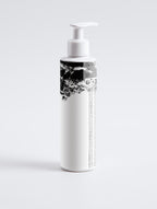 Anointed Garments Anointed Skin Silky Soft Cleansing Milk in a white pump bottle for gentle makeup removal.