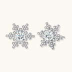 Anointed Garments Winter Spark Studs featuring round moissanite stones in platinum-plated sterling silver snowflakes.