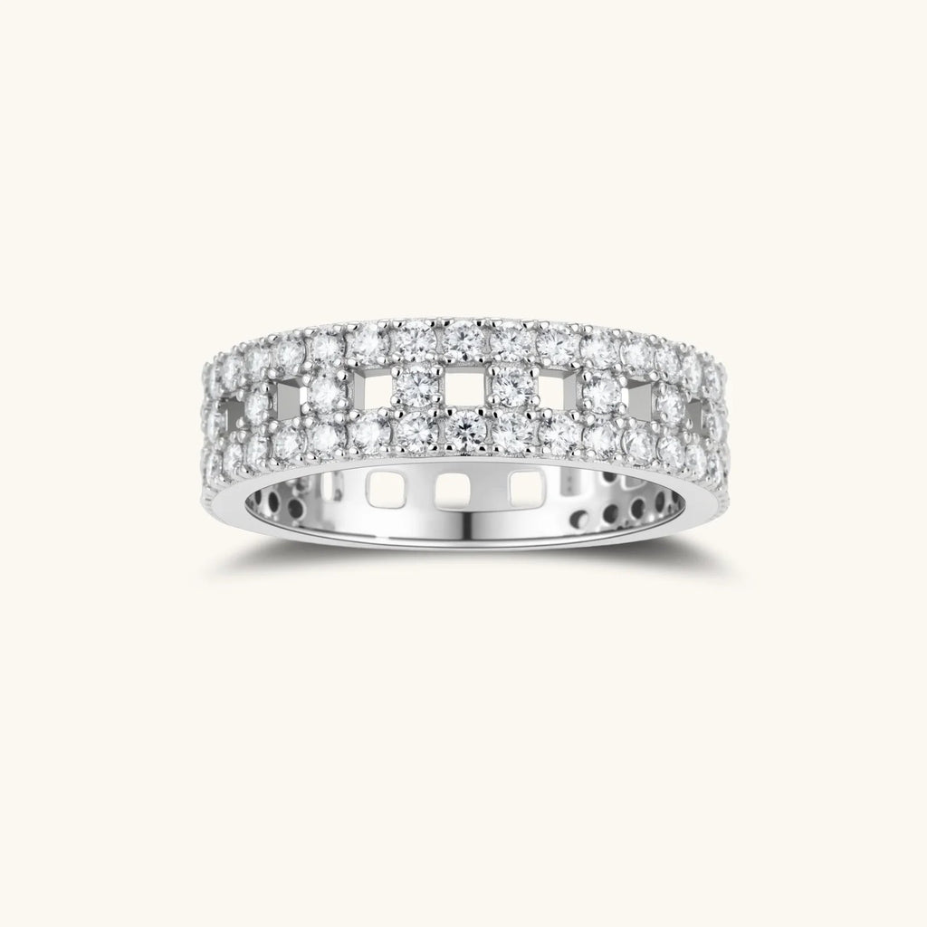 Anointed Garments Stellar Row moissanite ring featuring three rows of VVS1 stones on a platinum-plated silver band.