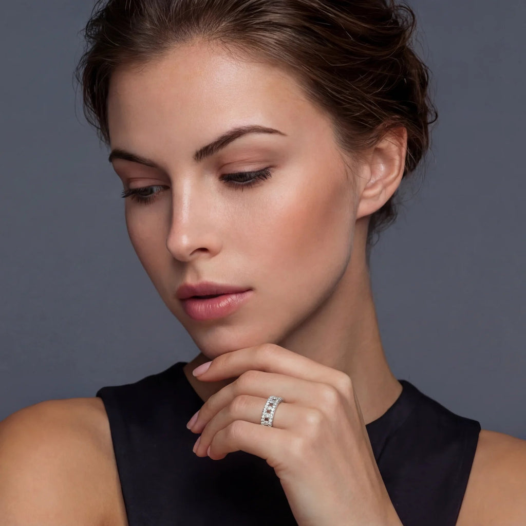 Anointed Garments Stellar Row Moissanite Ring featuring three rows of VVS1 moissanite on a platinum-plated silver band.