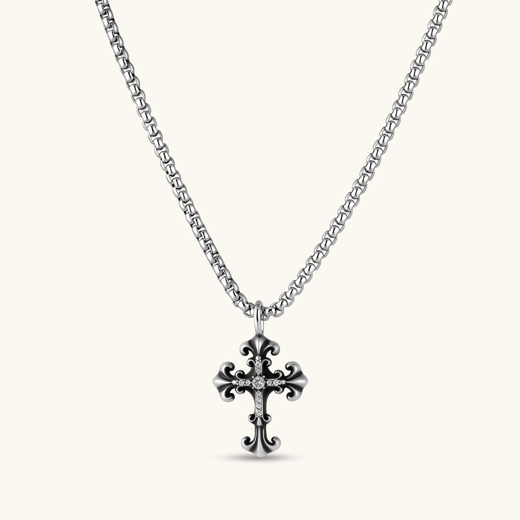 Anointed Garments sterling silver gothic cross pendant with crystal pavé accents and an oxidized finish on a chain.