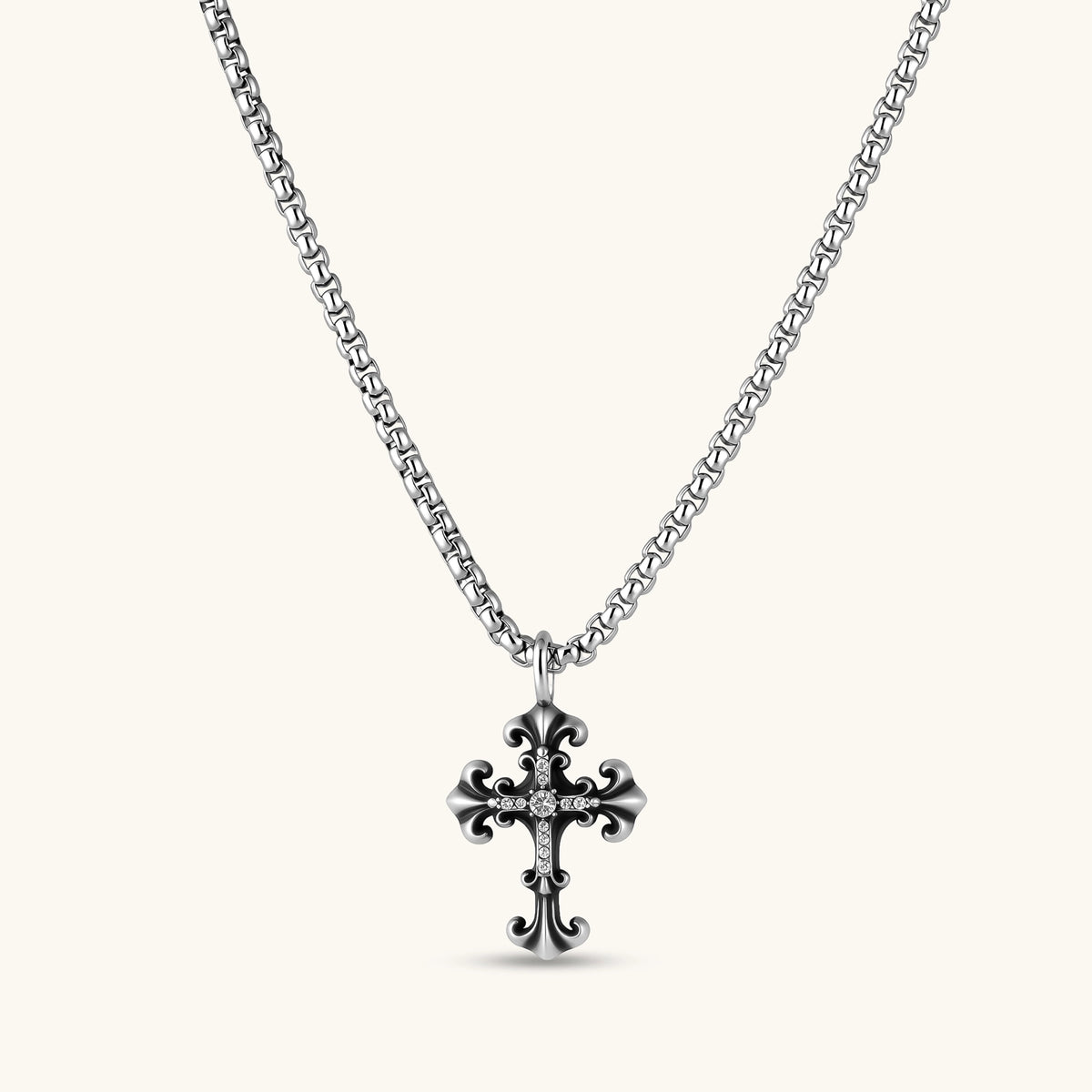 Anointed Garments sterling silver gothic cross pendant with crystal pavé accents and an oxidized finish on a chain.