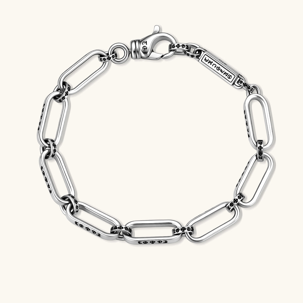 Anointed Garments sterling silver bar-link bracelet with engraved Gothic script detailing and a lobster clasp.