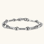 Anointed Garments sterling silver grunge link bracelet with engraved Gothic script and polished finish.