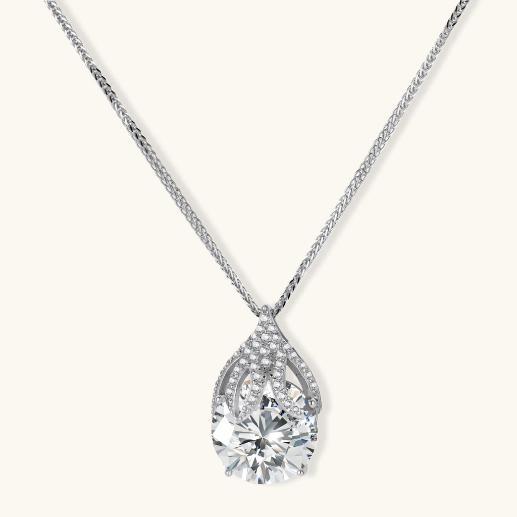 Anointed Garments Teardrop Brilliance Necklace featuring a 5-carat round moissanite in platinum-plated sterling silver.
