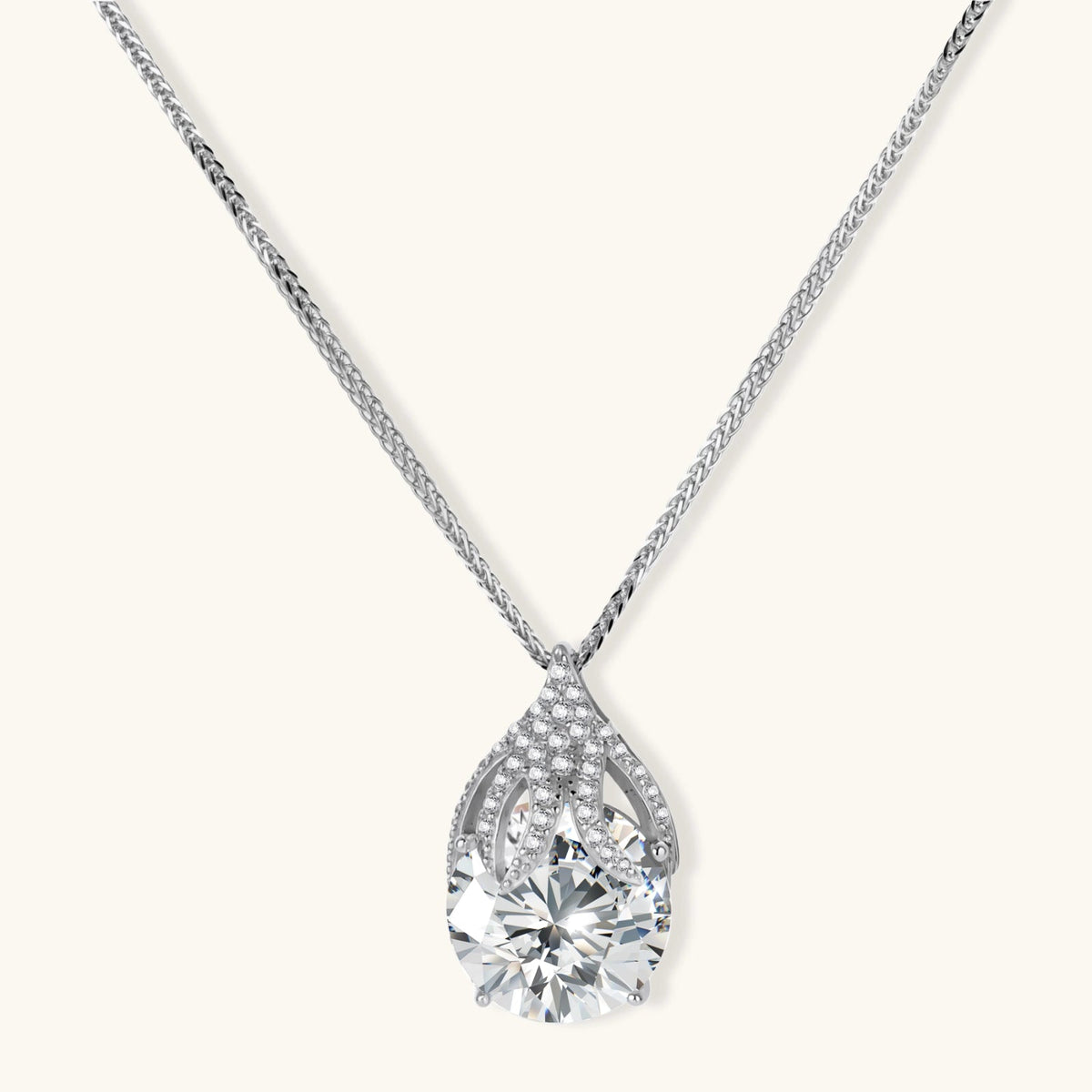 Anointed Garments Teardrop Brilliance Necklace featuring a 5-carat round moissanite in platinum-plated sterling silver.