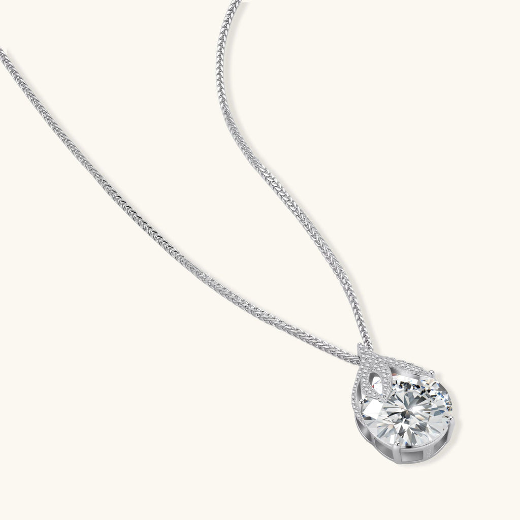 Anointed Garments Teardrop Brilliance Necklace featuring a 5-carat round moissanite in platinum-plated sterling silver.