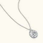 Anointed Garments Teardrop Brilliance Necklace featuring a 5-carat round moissanite in platinum-plated sterling silver.