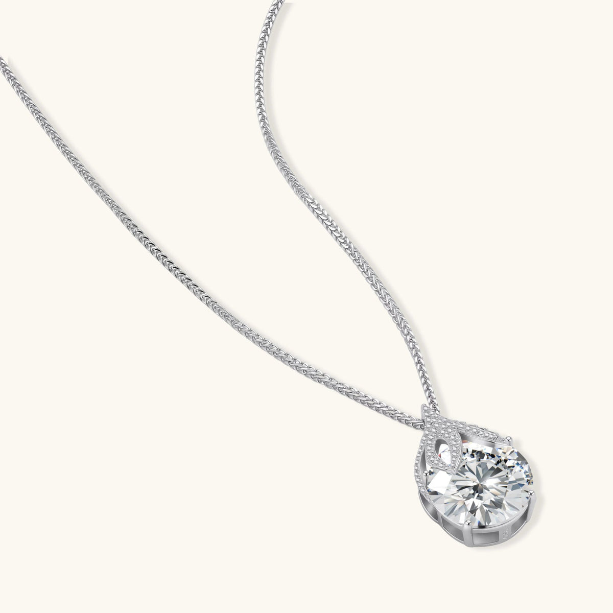 Anointed Garments Teardrop Brilliance Necklace featuring a 5-carat round moissanite in platinum-plated sterling silver.
