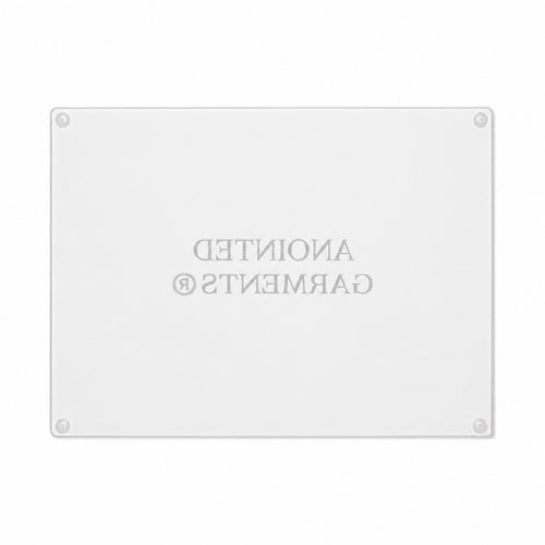 Anointed Garments tempered glass cutting board with a rectangular shape, whorled texture, and non-slip rubber feet.