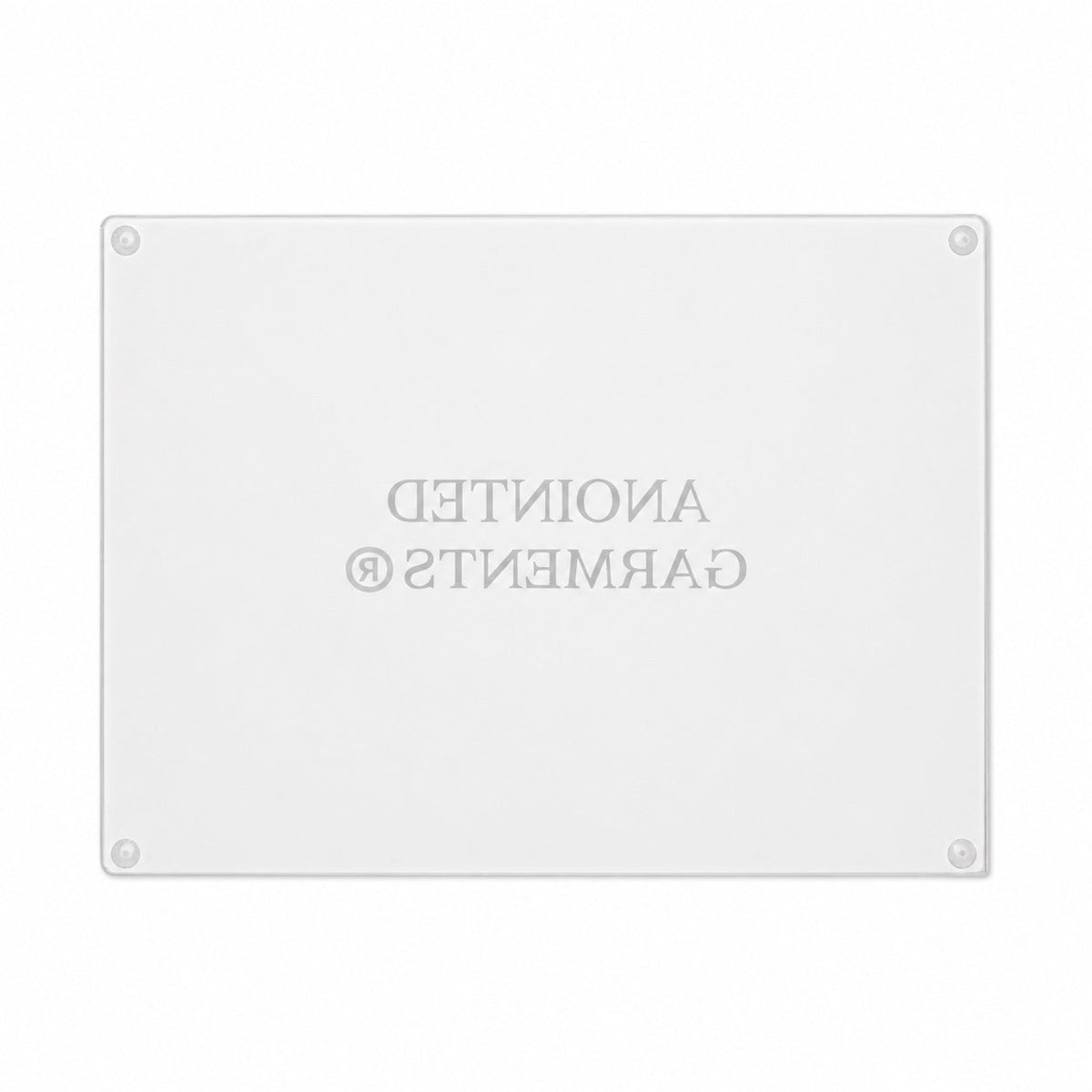 Anointed Garments tempered glass cutting board with a rectangular shape and a whorled-texture surface.