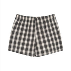 Anointed Garments unisex plaid shorts in black and white, featuring a comfortable elastic waist and lightweight fabric.
