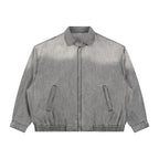Anointed Garments unisex vintage wash grey denim jacket with a full-zip front, lapel collar, and elasticated hem.