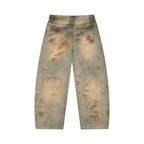 Anointed Garments men's relaxed barrel-leg jeans in vintage wash denim with distressed brown sun-faded accents.