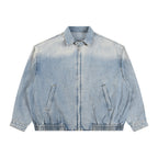 Anointed Garments unisex vintage wash denim jacket with a full-zip front, lapel collar, and elasticated hem.