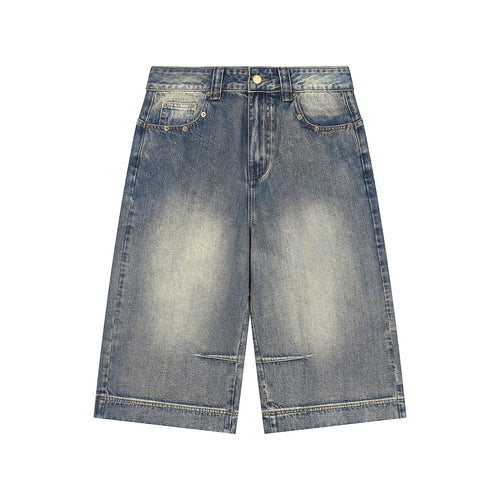 Anointed Garments vintage wash baggy denim shorts in blue with a mid-waist, loose fit, and classic pocket detailing.