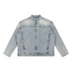 Anointed Garments vintage wash denim jacket with a zip-up front, drop shoulders, and a round neck in light blue.