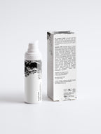 Anointed Garments Vitamin C brightening serum bottle and packaging box with black and white botanical print design.