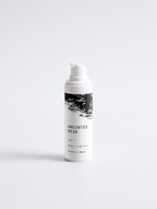 Anointed Garments Anointed Skin Vitamin C serum bottle with white pump dispenser and black and white label design