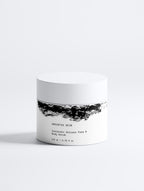 Anointed Garments Anointed Skin Volcanic Sand Face and Body Scrub in a white jar with minimalist black label design.