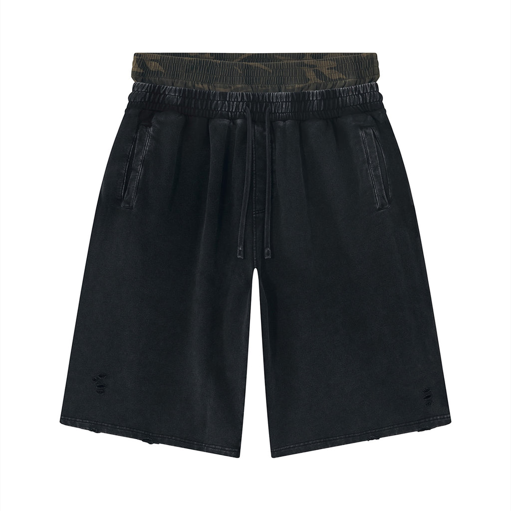 Anointed Garments washed-black cotton shorts with elastic waistband, drawstring, and distressed hem details.