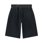 Anointed Garments washed-black cotton shorts with an elastic waistband, rear patch pocket, and relaxed fit.