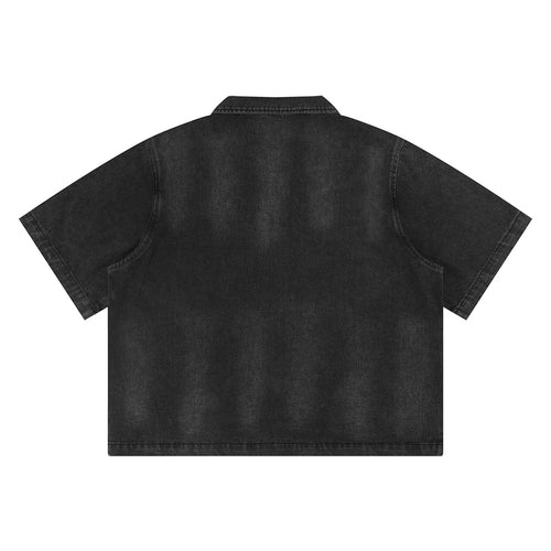 Anointed Garments unisex vintage washed black denim shirt, back view showing short sleeves and drop shoulder design.