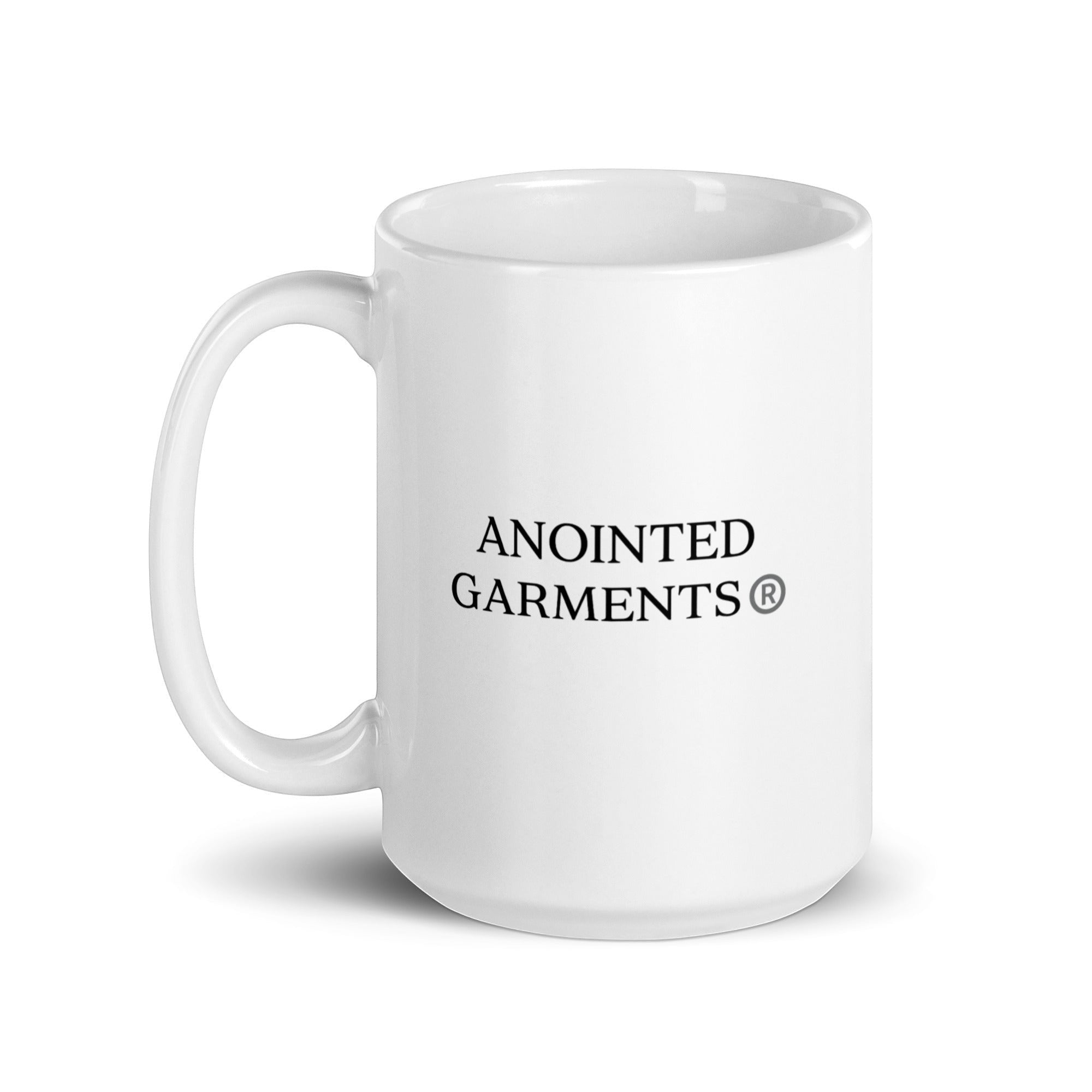 Anointed Garments white glossy ceramic mug with black logo print, dishwasher and microwave safe.