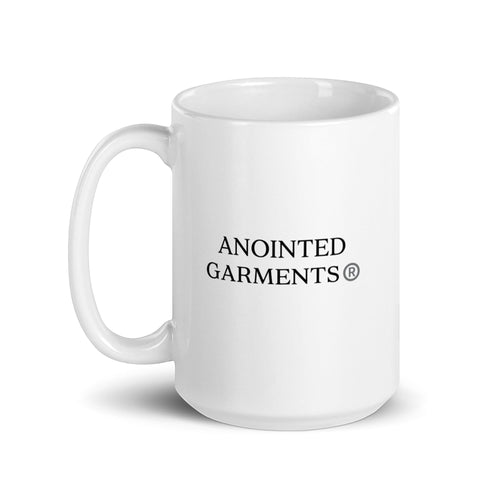 Anointed Garments white glossy ceramic mug with black logo print, dishwasher and microwave safe.