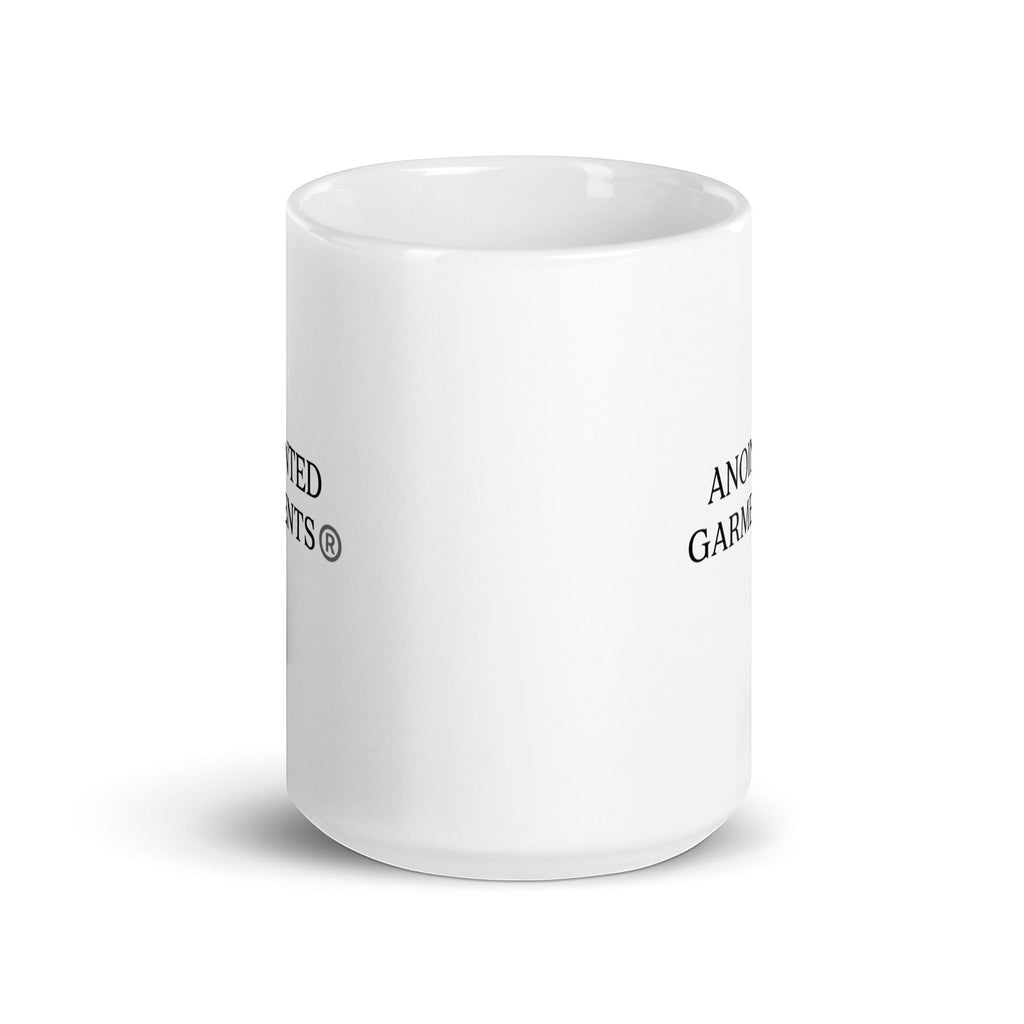 Anointed Garments white glossy ceramic mug with black branding on a clean white background