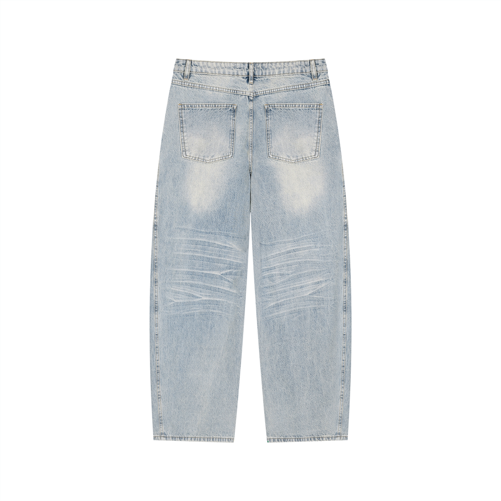 Anointed Garments men's wide-leg jeans in light blue enzyme-washed denim with vintage whiskering and back pockets.